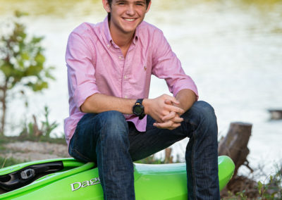 make teen sitting on kayak